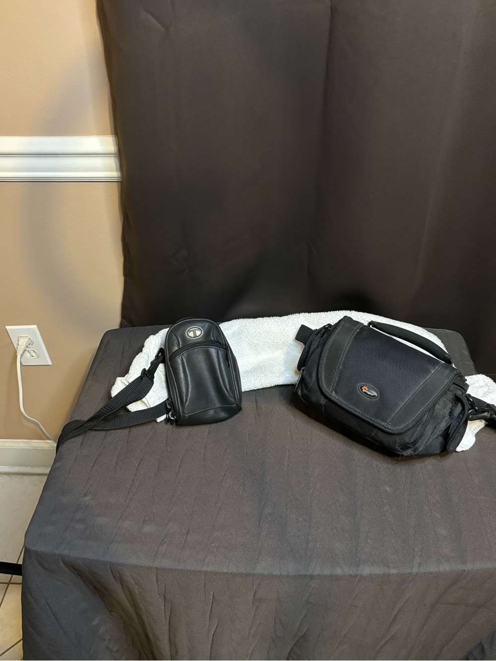 Lowepro Black Camera Shoulder Bag with Compact Holster and a free bag.